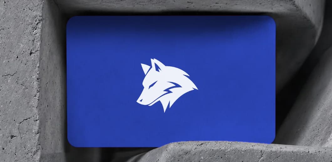 A blue card carrying the mark, wedged into a slot in cast concrete.